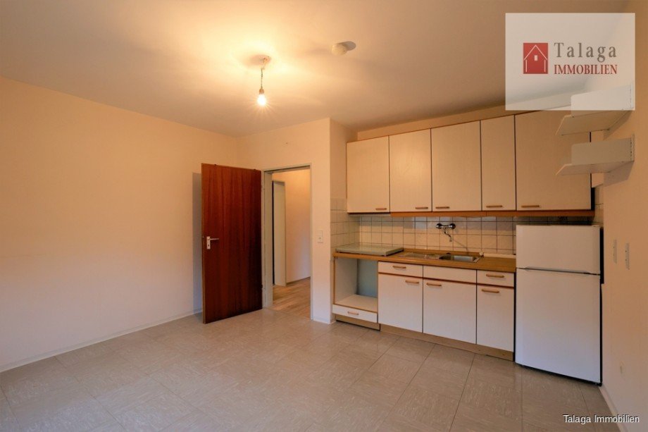 Wohnbereich Einliegerwohnung mit Kochnische Bild 3 Reiheneckhaus Bochum